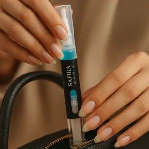 girl holding safira blue nail serum