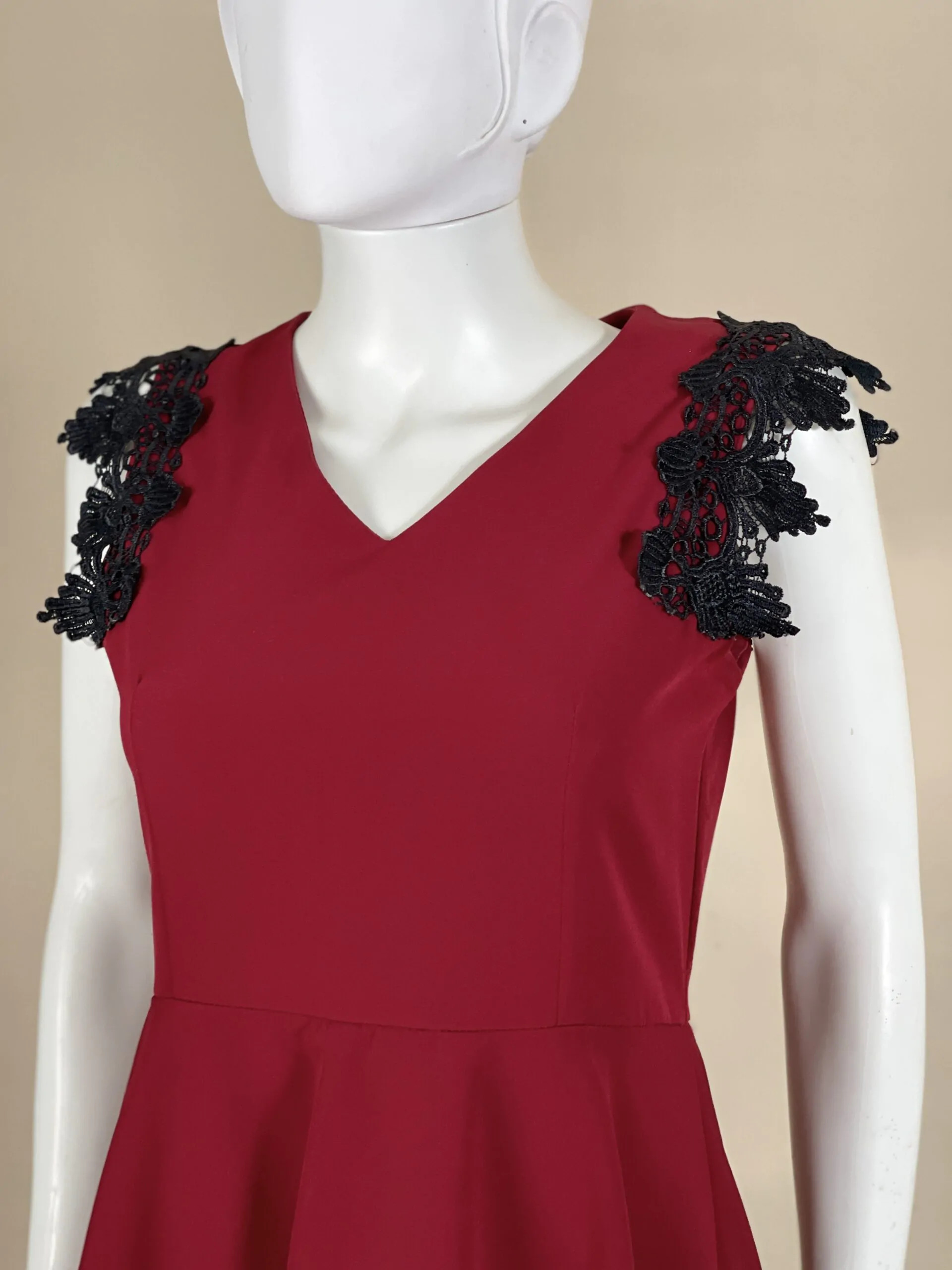 Red dress with black lace from the shoulder and bottom
