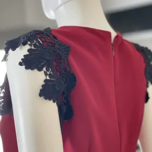 Red dress with black lace from the shoulder and bottom